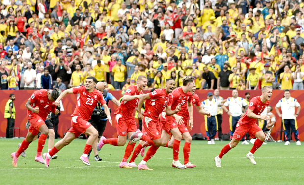 <p>Above, Switzerland&rsquo;s Djibril Sow and teammates celebrate after the penalty shootout.</p>